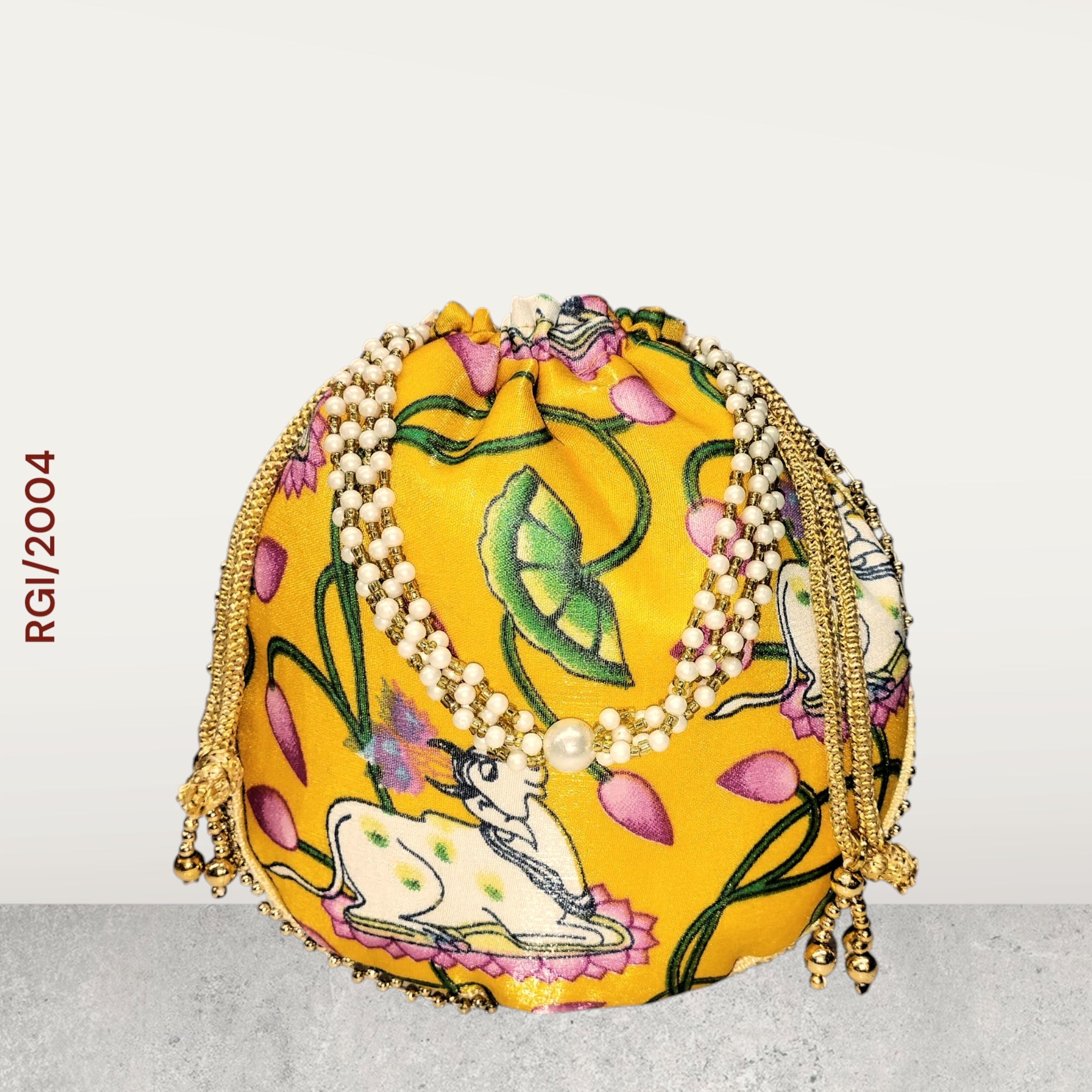 RETURN GIFT ITEMS PICHWAI COW PRINT SILK POTLI BAGS