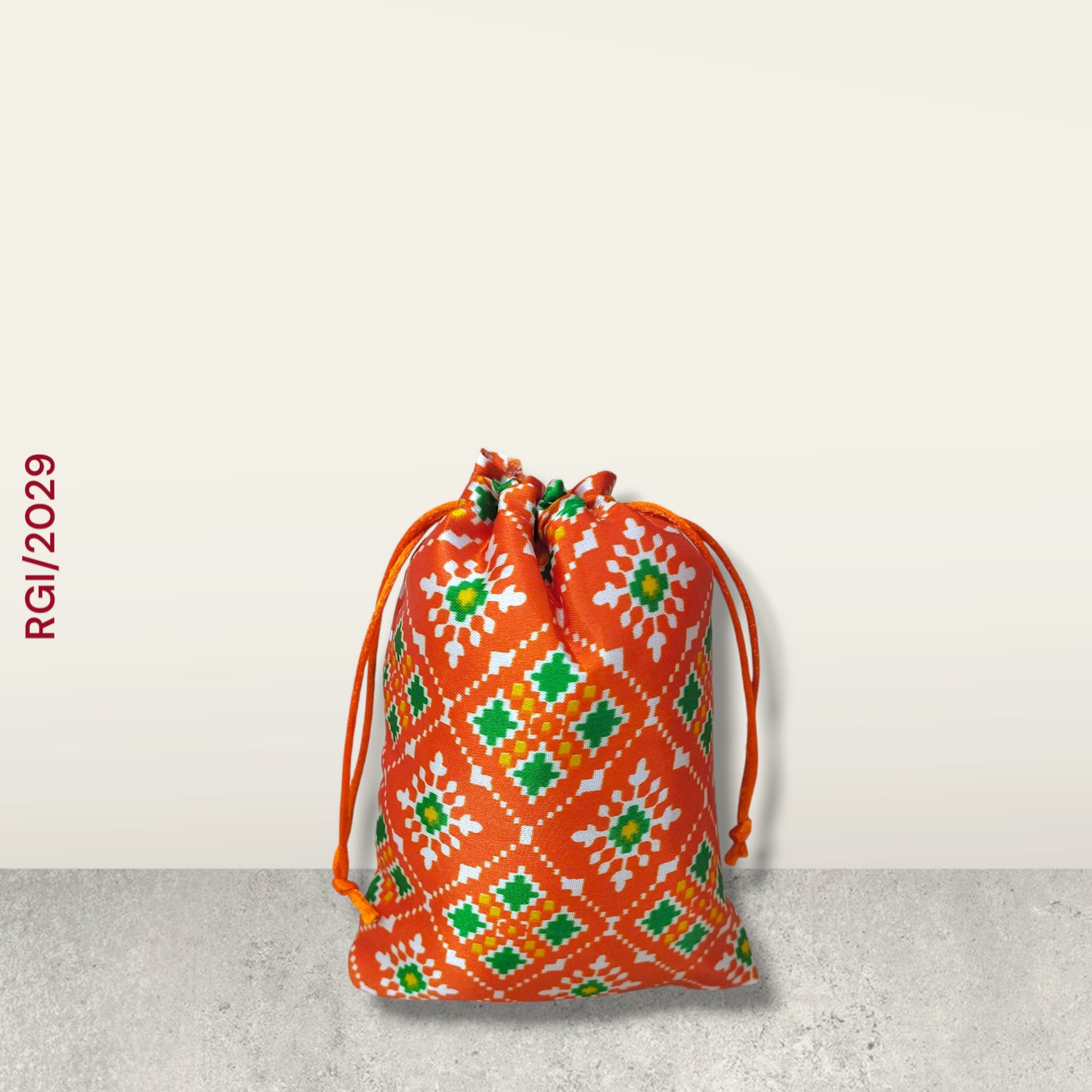 RETURN GIFT ITEMS 250 GMS PATOLA PRINT PACKING POTLI BAG