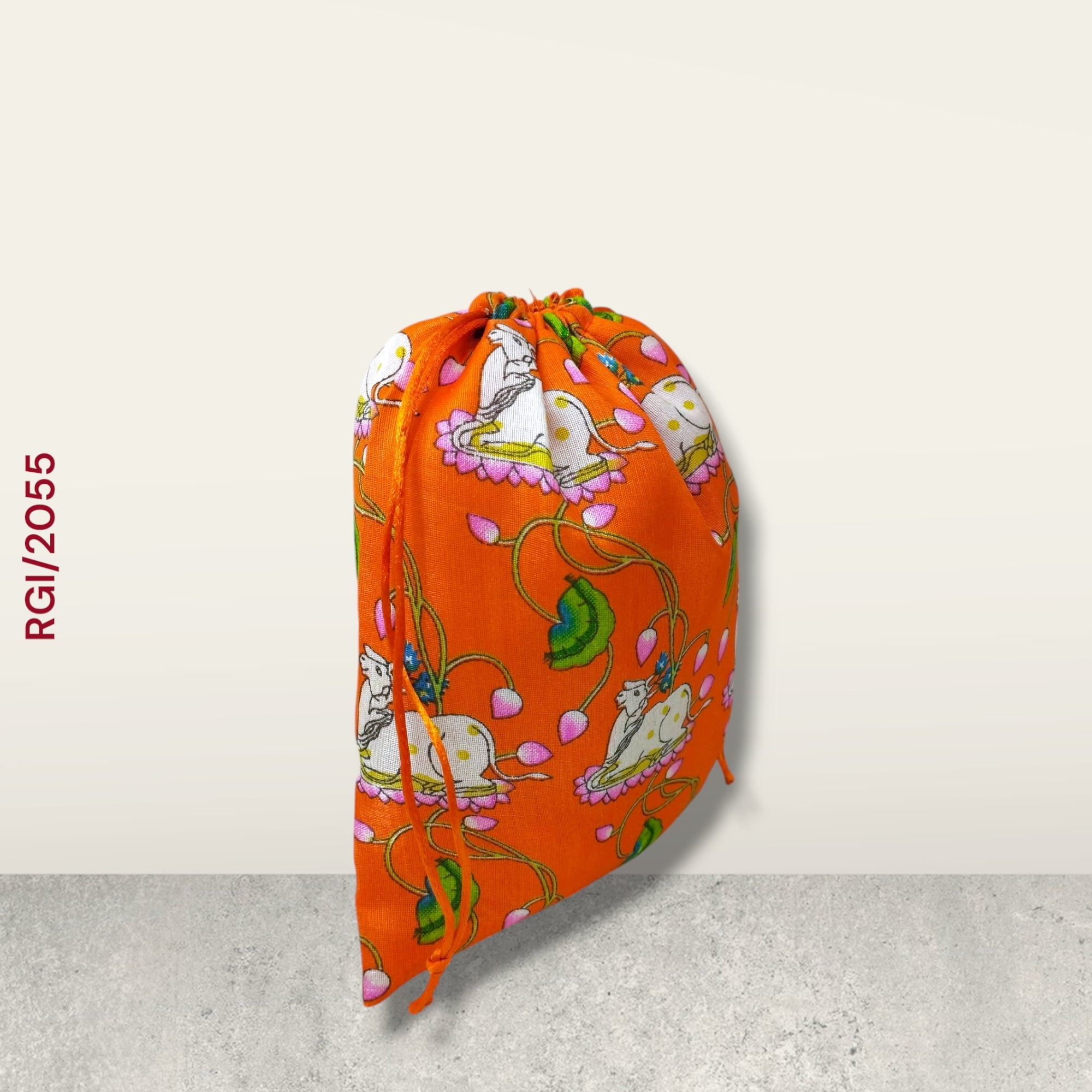 RETURN GIFT ITEMS 500 GMS COW PRINT POTLI BAG